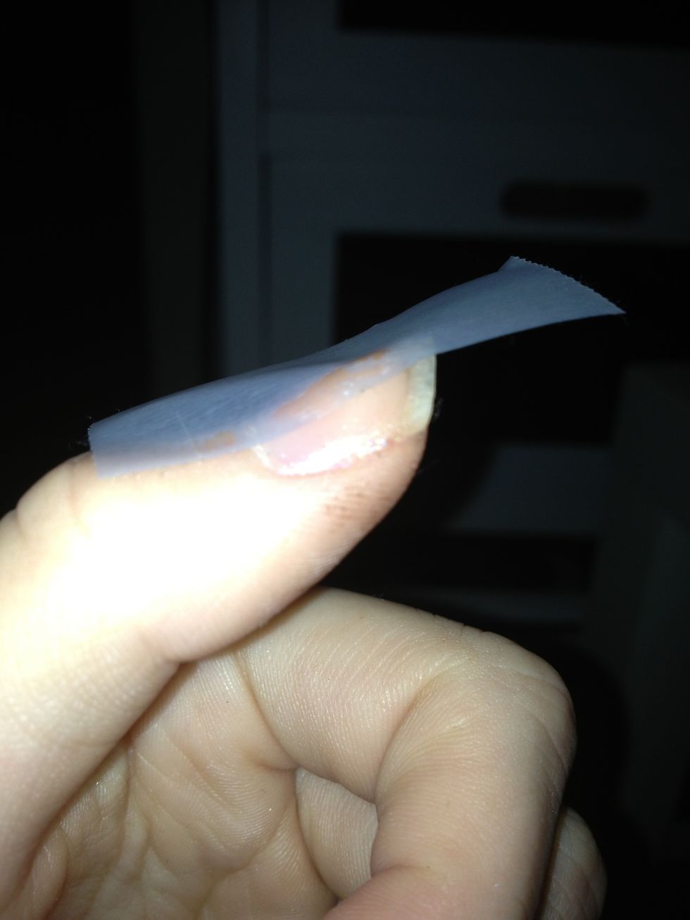 Then apply a tape over your nail..
