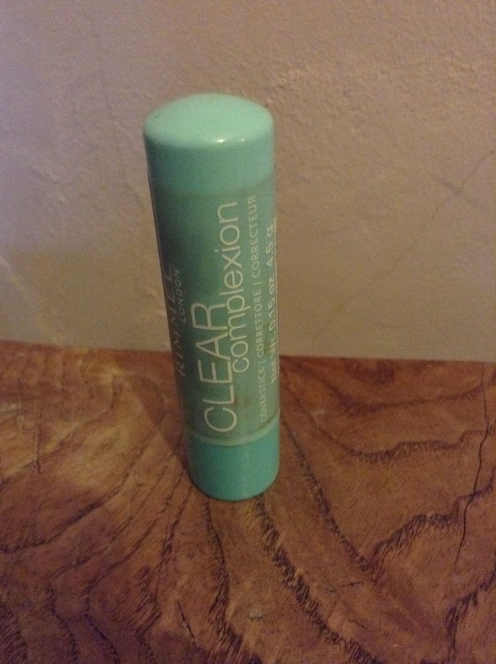 Then, apply concealer that's a couple shades lighter than your normal skin tone underneath your eyes and over any imperfections.