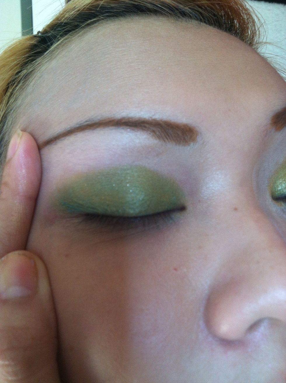 Then, apply no.1 color from the palette. Apply the brown shadow by tapping not a swipping motion using the medium flat brush.This is what it would look like.