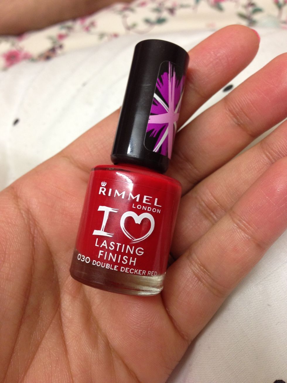 Then apply the red shade, i am using double decker red by rimmel