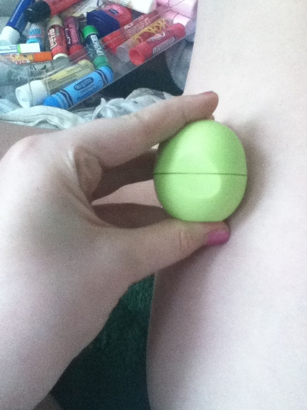 Then apply your other lip balm this is a eos and its honeysuckle honey dew