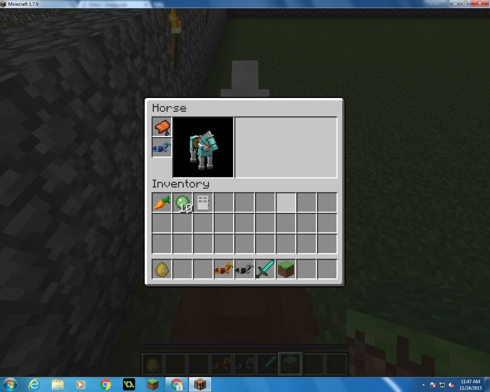 Then as you are on the horse you want to press E, as like you are going to your inventory, after you press E it will have at the top left spots where you can put the saddle and armour.