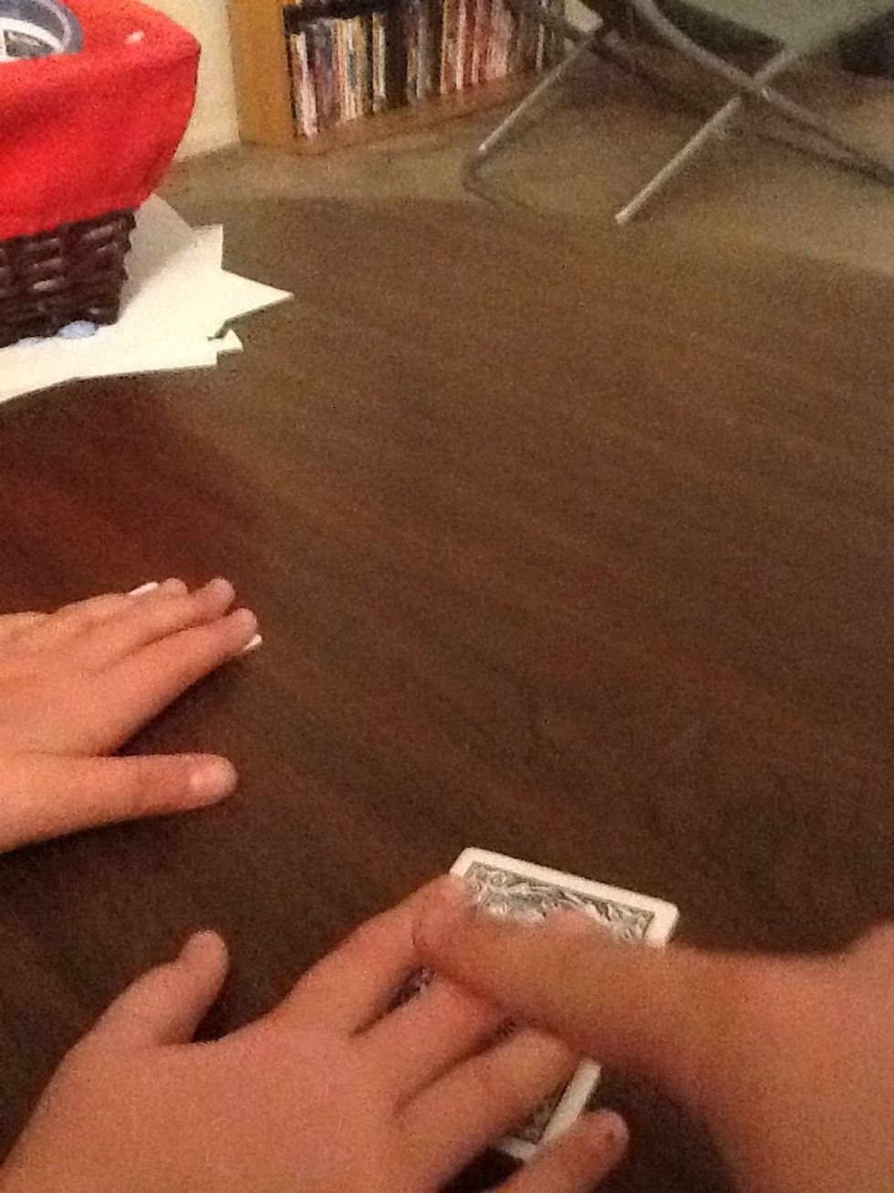 Then ask if they can lift up the card with there card under