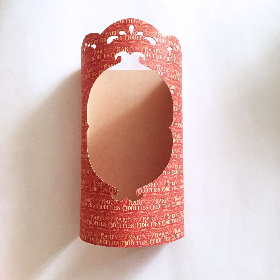 Then attach and glue over to the other end of the cover completing the candle cover.