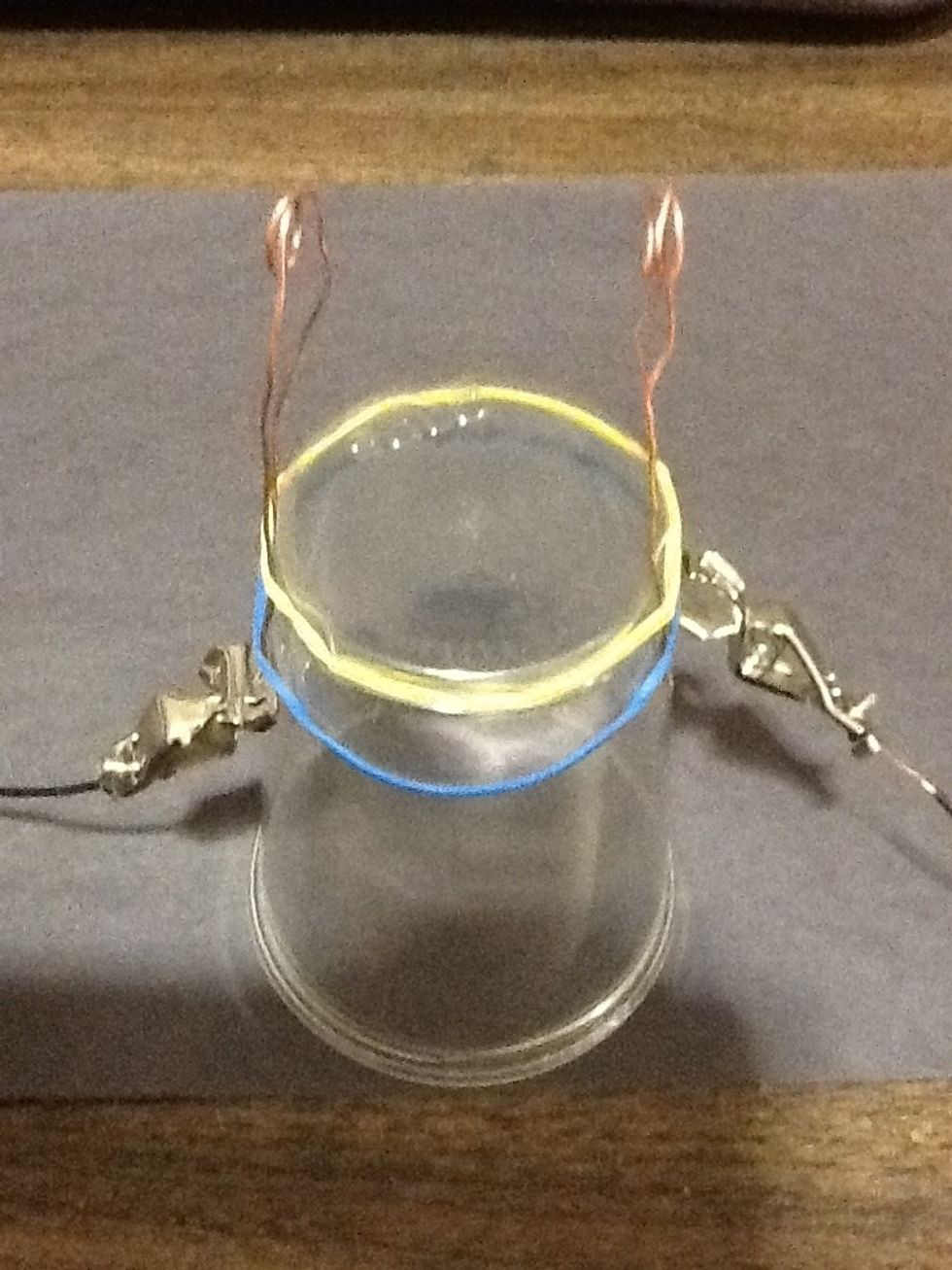 Then attach the alligator clip to the end of the bare copper wire.