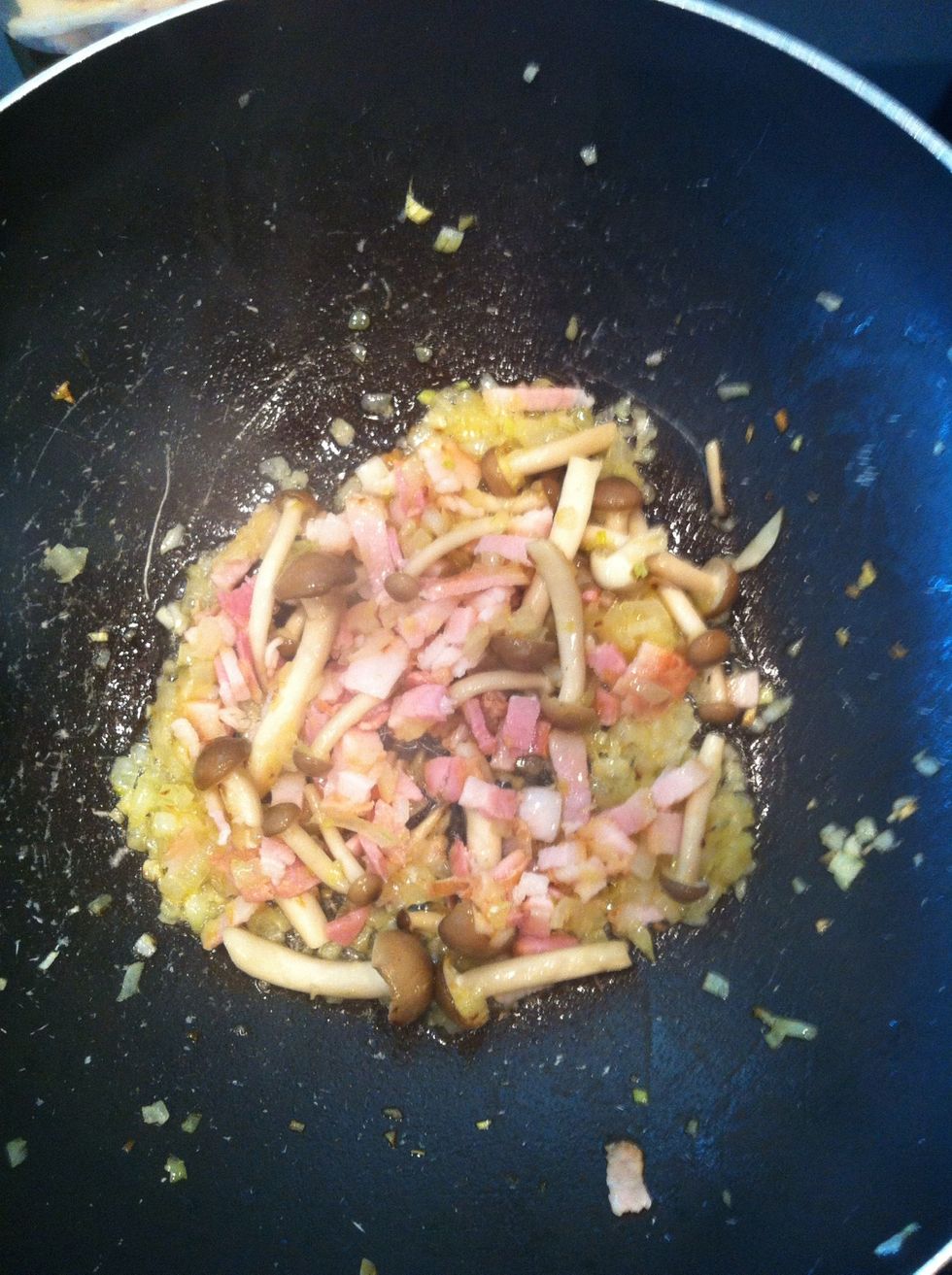 Then bacon and mushroom mix till it starting to cook