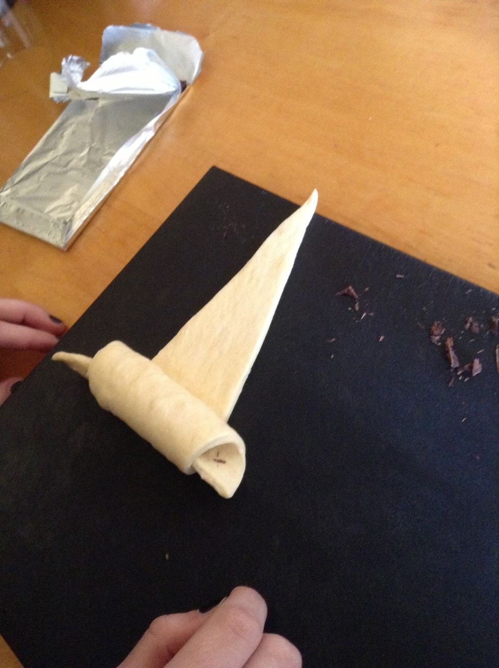 Then begin rolling it.