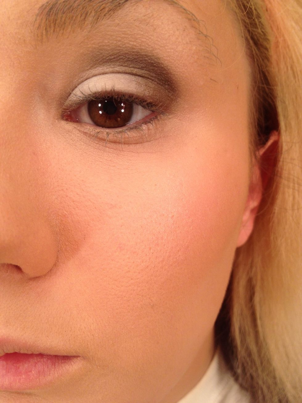 Then blend it out with your finger. This creates a base for your next color to make it pop!