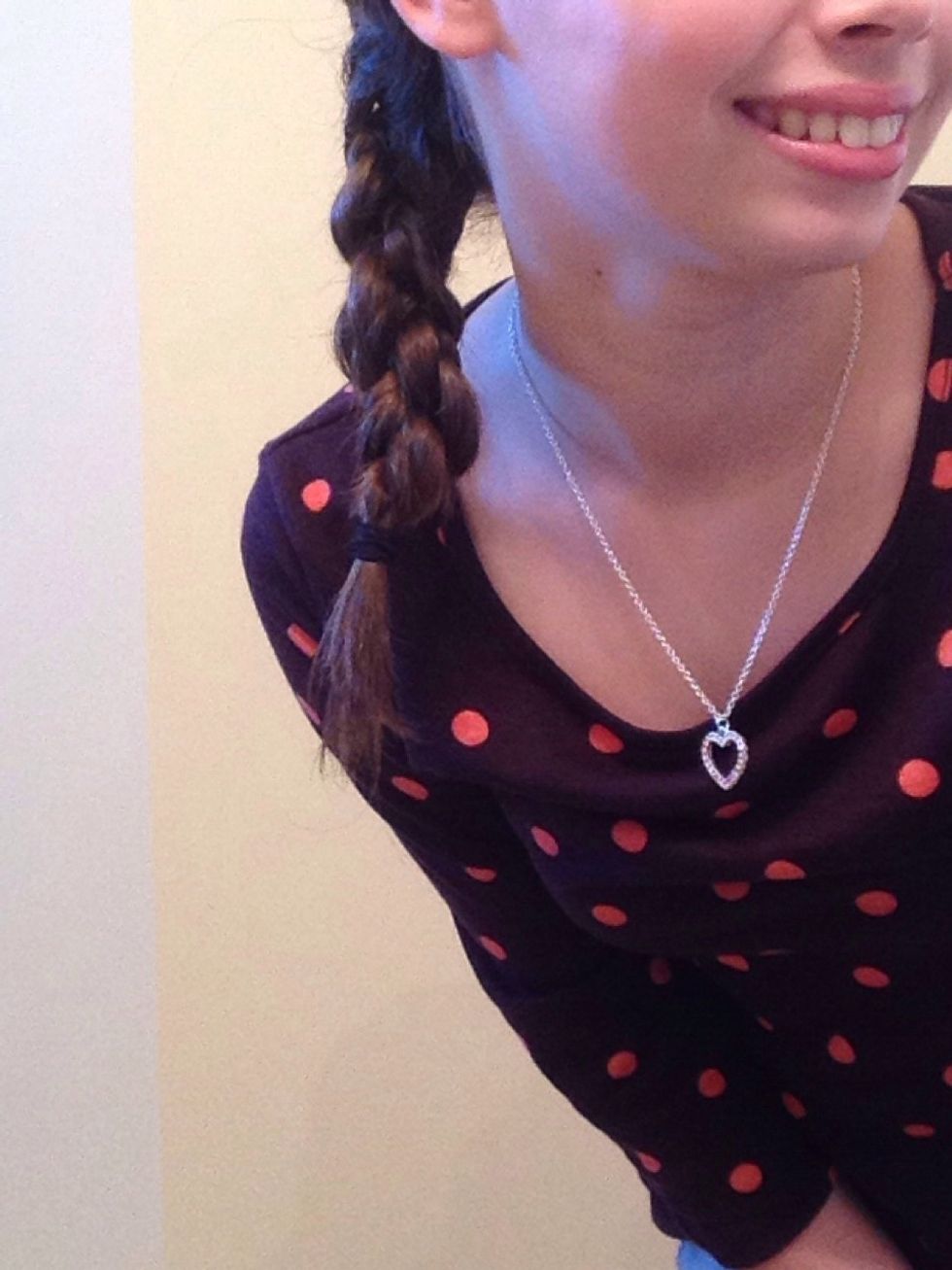 Then, braid all the sections together and tie off with a tie once more. Apply hairspray. This hairstyle is for the most casual of events such as running errands or hanging out with some friends.