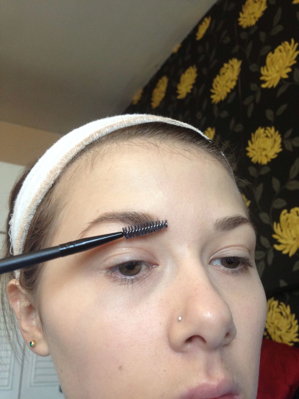 Then brush gently through your brow to soften any harsh pencil lines