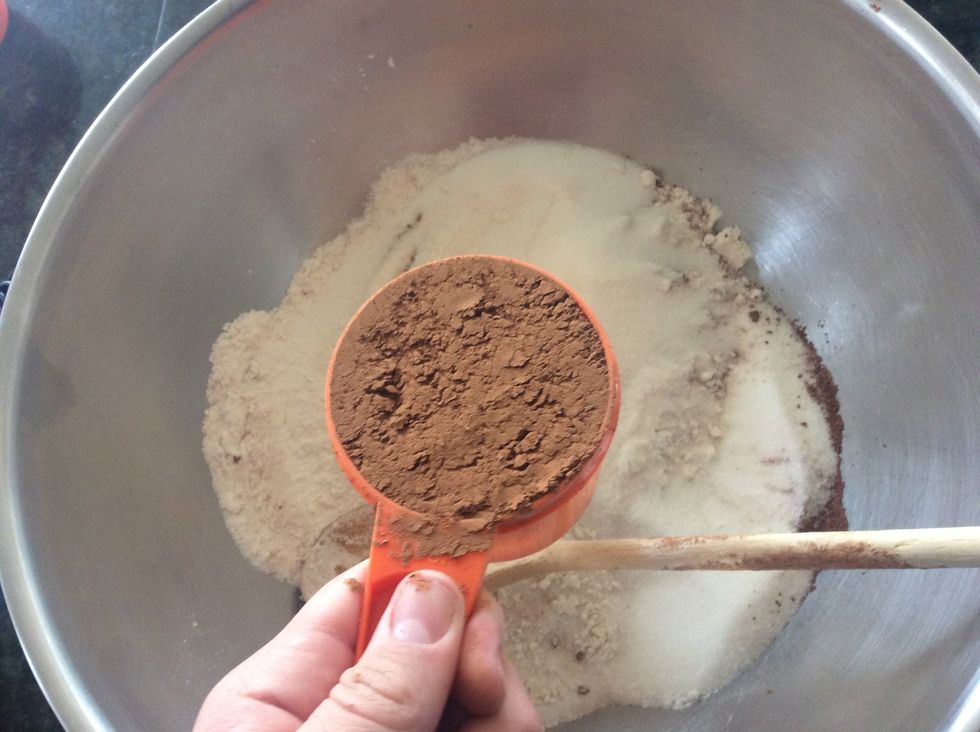 Then by using the dipping method add 1cup of cocoa. This time level it off over the mixing bowl. This will give a little extra flavor while not letting the cake become to bitter