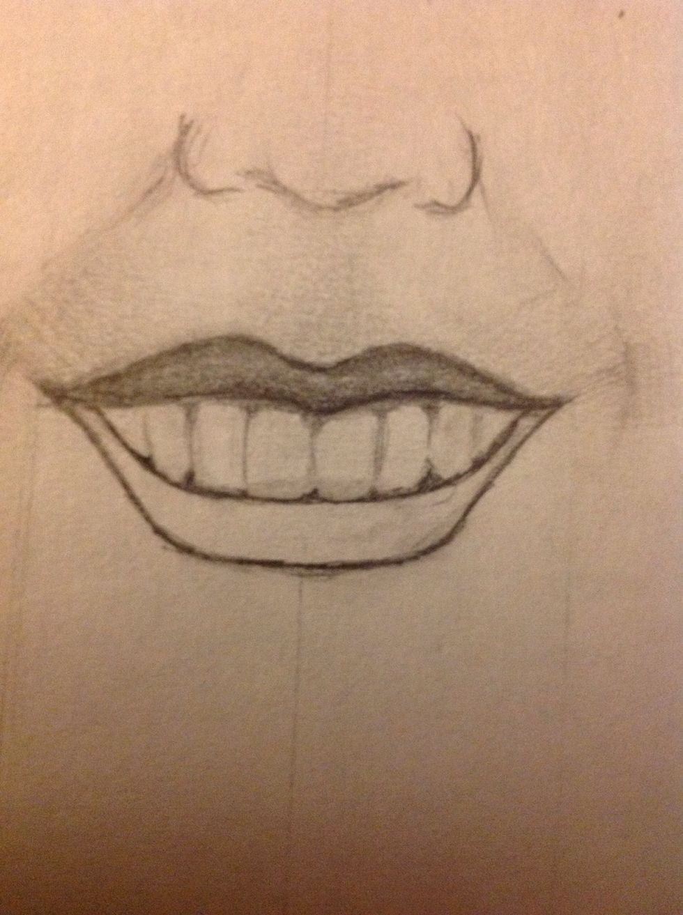 Then, carefully and very softly, make the gums. Maybe you will need to darken the upper lip.