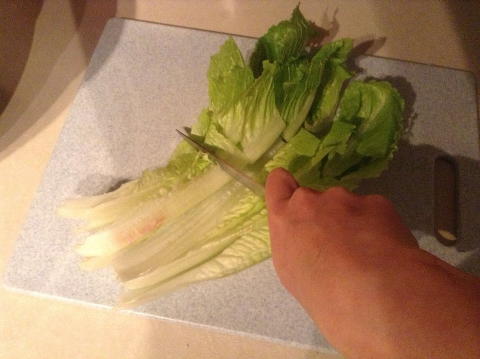 Then carefully cut horizontally across your lettuce