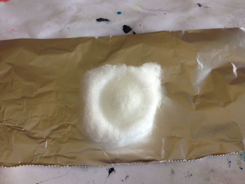 Then center the cotton balls on your piece of foil.