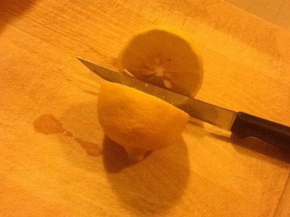 Then chop the lemon in half