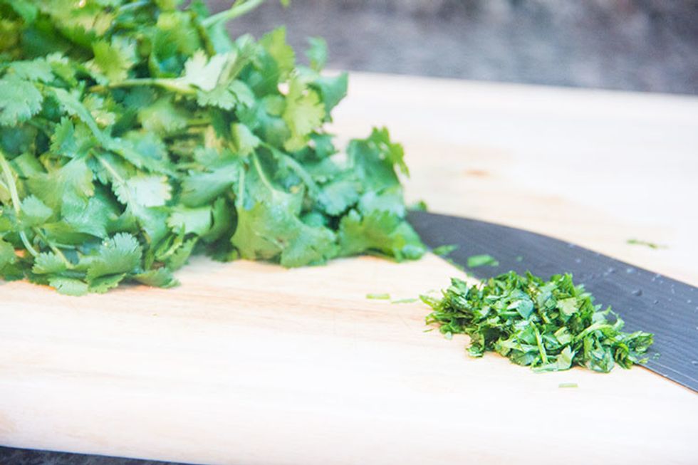 Then chop up some cilantro. This fresh herb is a key ingredient in this dish! If you don't like cilantro, try chopping up fresh chives instead. (Or use both!)
