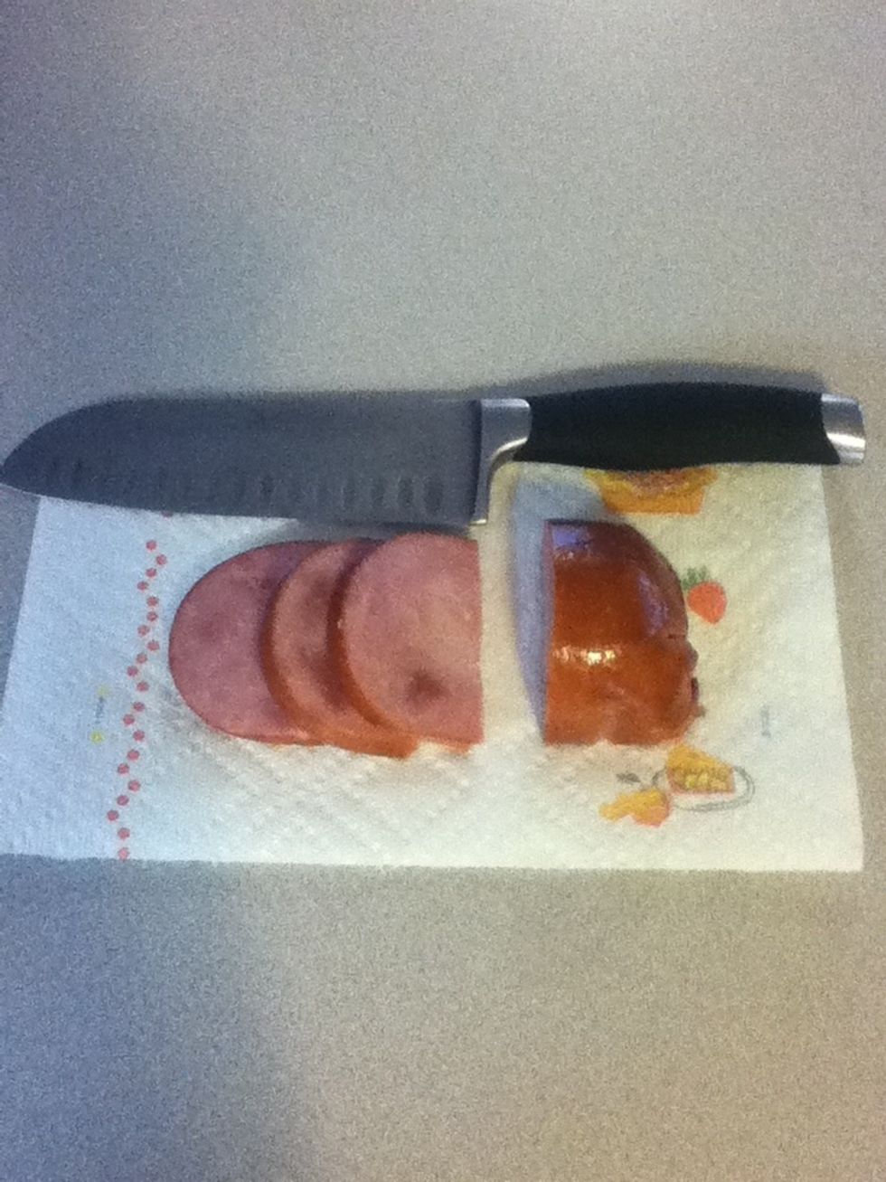 Then chop yer ham in nice thick slices. The best ham here is Tasso, a Cajun smoked ham from Louisiana. My butcher didn't have it today, so I'm using this cheapo chunk ham. Just don't use lunch meat.