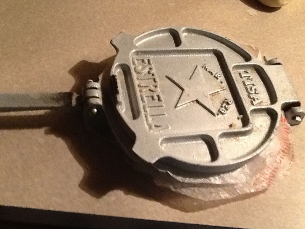 Then close the top of the press like this