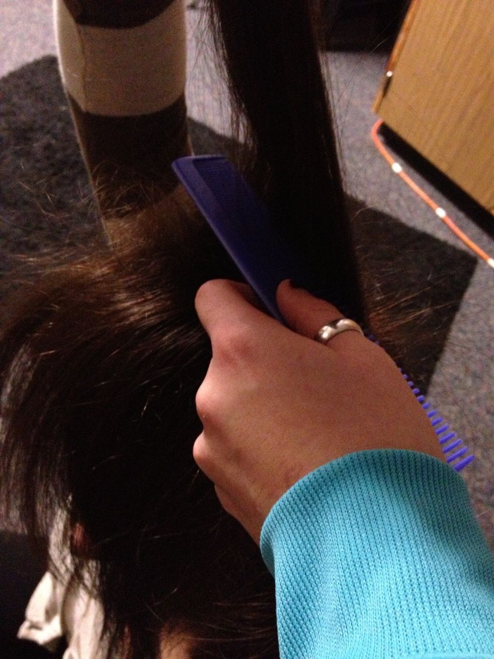 Then comb down in the front of the layer.