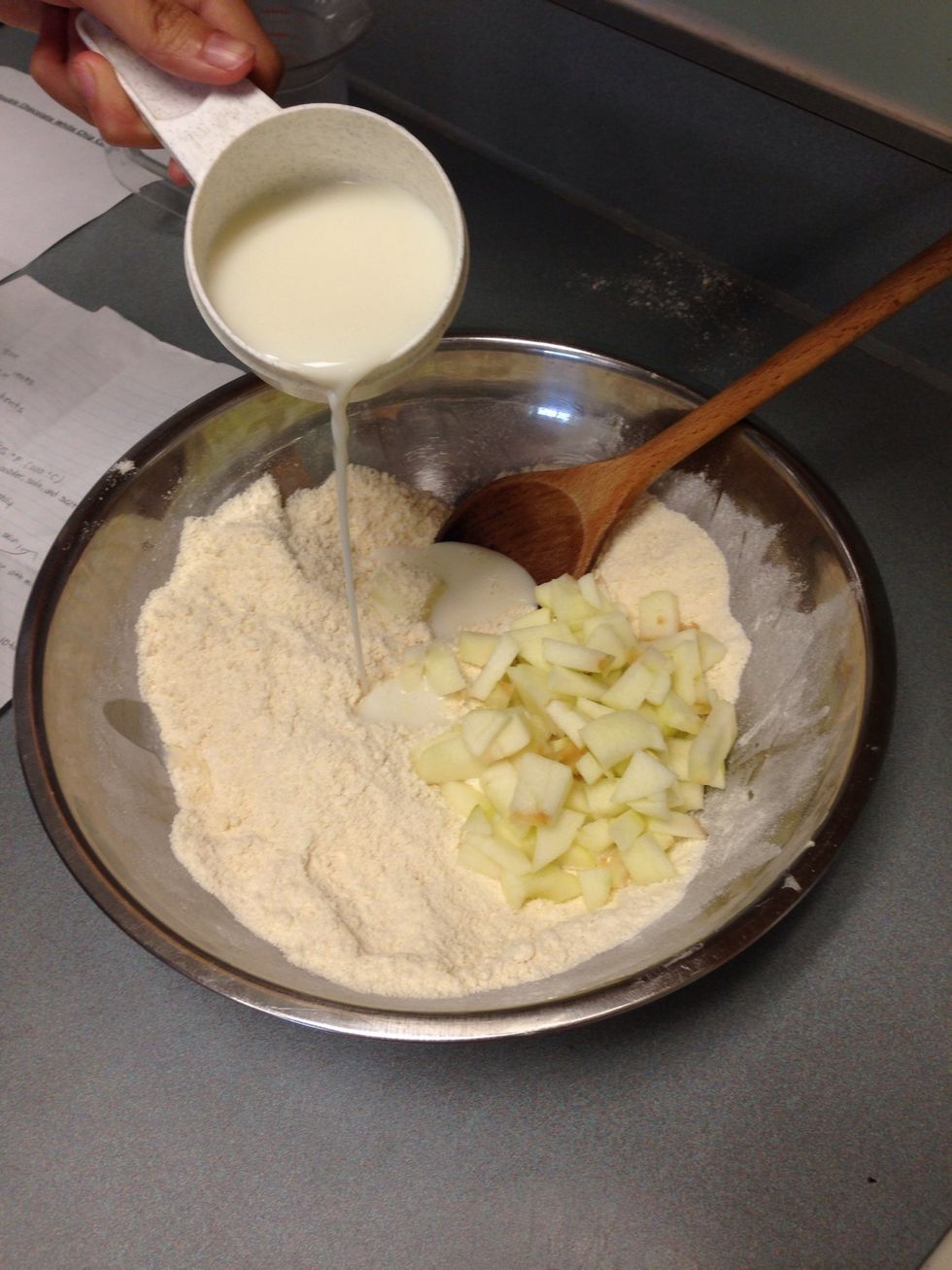 Then combine milk and apples to the dry mixture