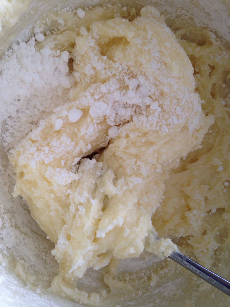 Then combine the 4 cups of confectioners sugar and 1 tsp of vanilla.