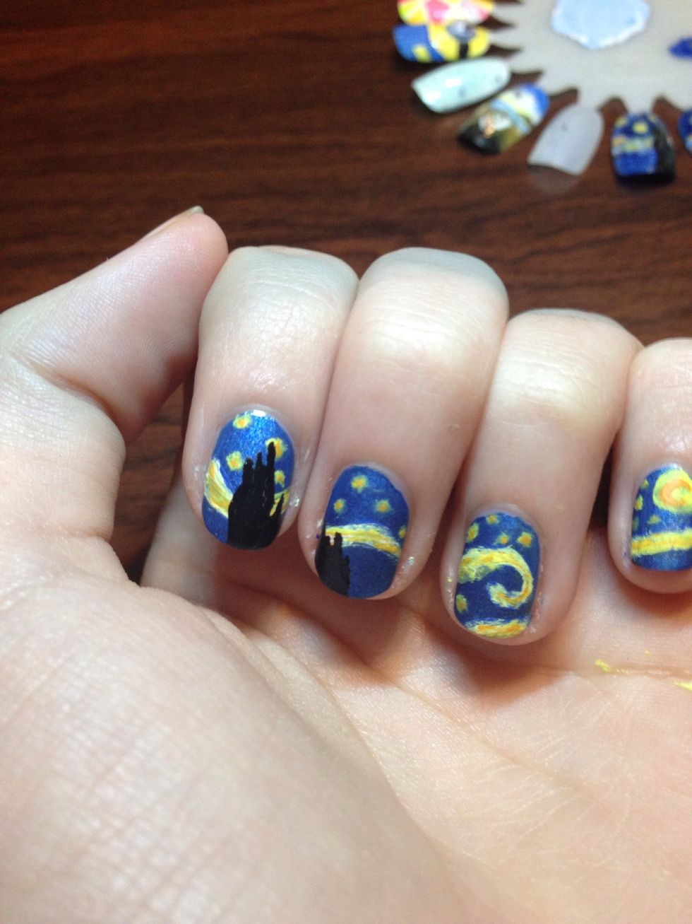 Then connect and fill in. Also make a smaller rocky forrmation on the index finger using the same process