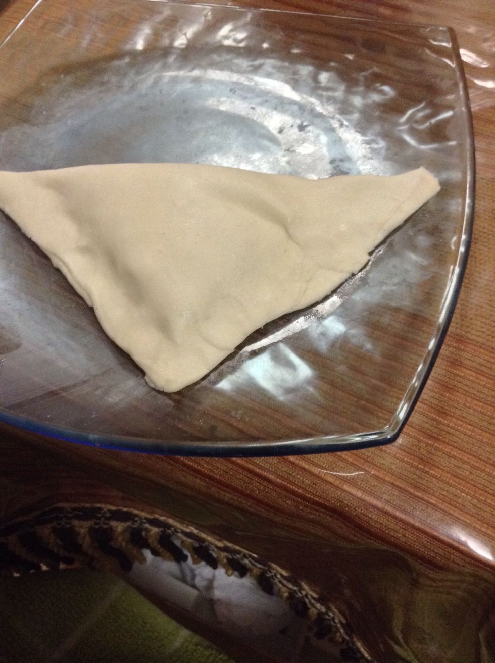 Then cover it with the other half to form a triangle