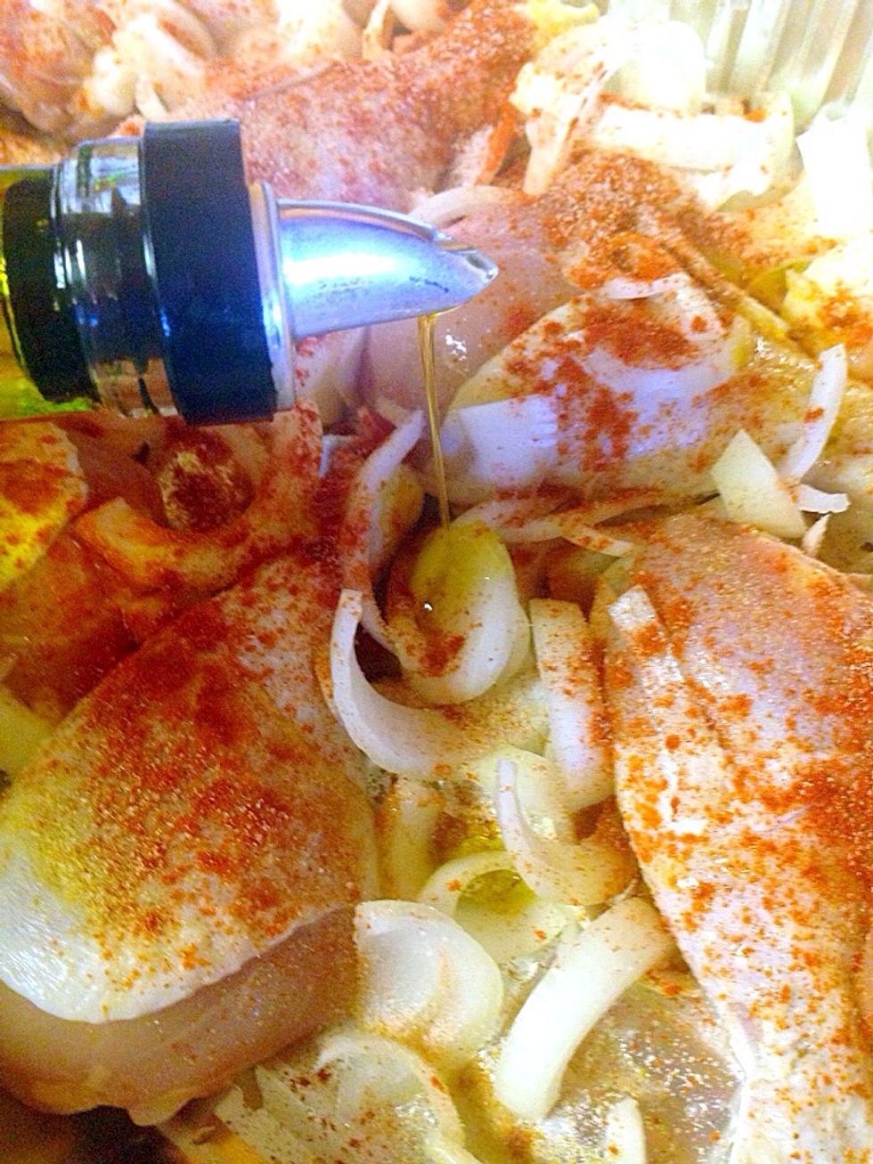 Then cover with 2 tablespoons of olive oil