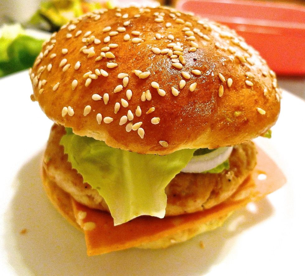 Then cover with the other upper half of the bun.