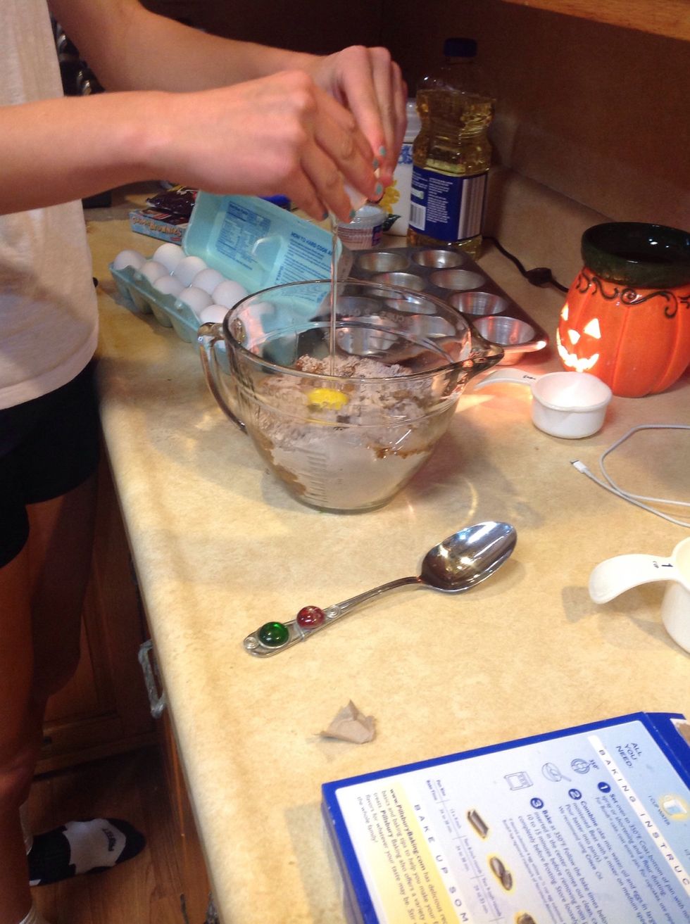 Then, crack 3 eggs into the bowl.