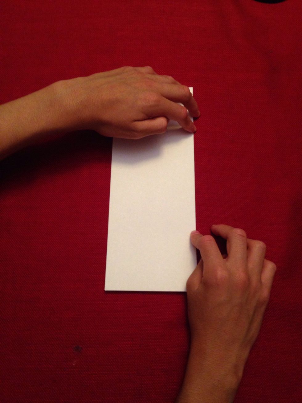 Then crease the paper to make it look like two halves.