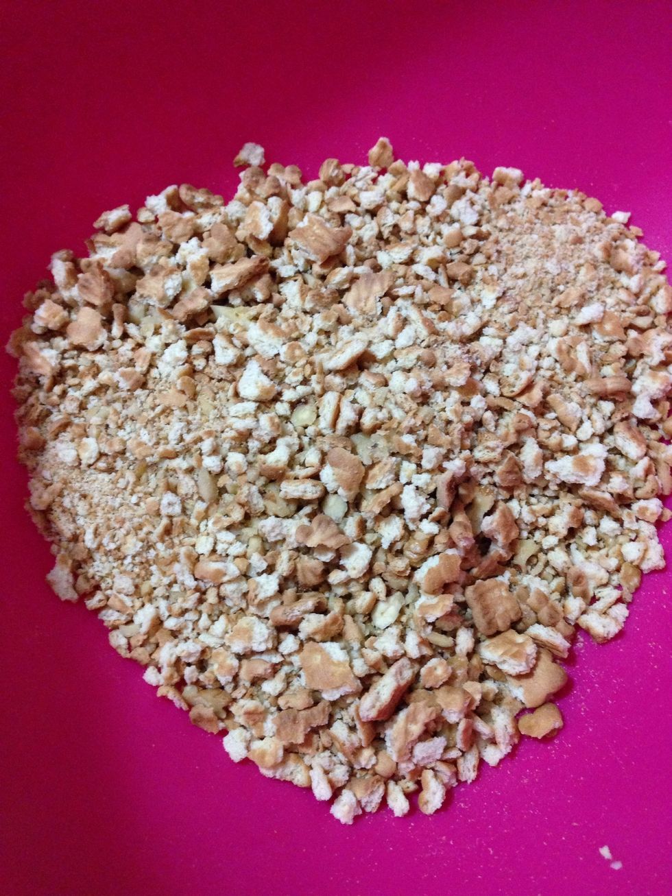 Then,crumble one and half pact petib\u00f6r biscuits,add 1 small spoonful of cinnamon and walnuts.