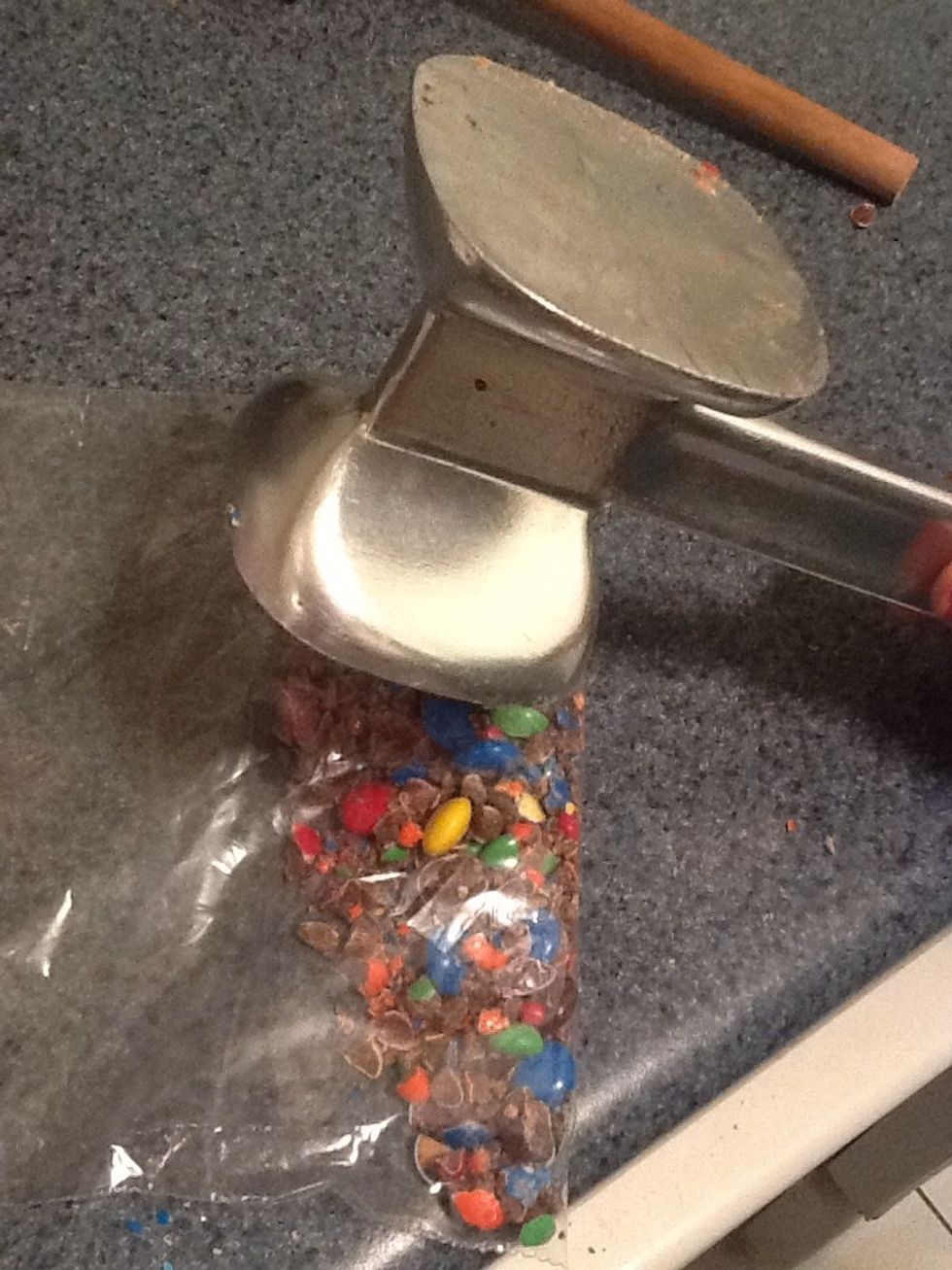 Then, crush with a cooking hammer Or anything else to crush it.