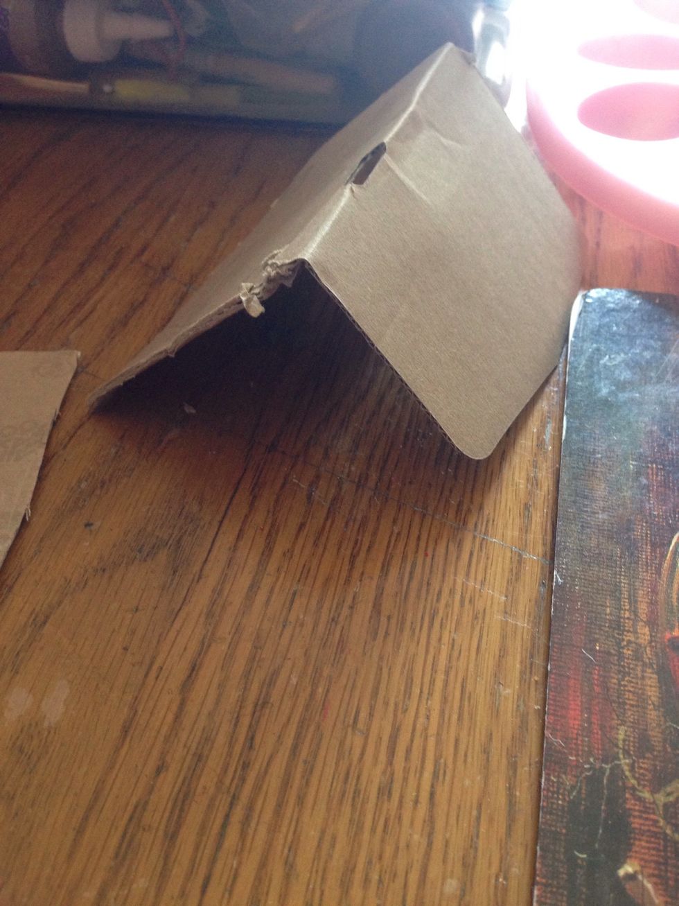 Then cut a larger square for the roof ( you will bed it to make it look like a roof)