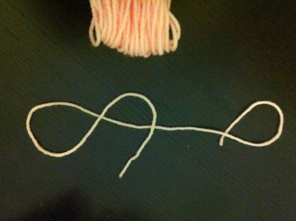 Then cut a piece of string about 30cms depending on whether u want a tail