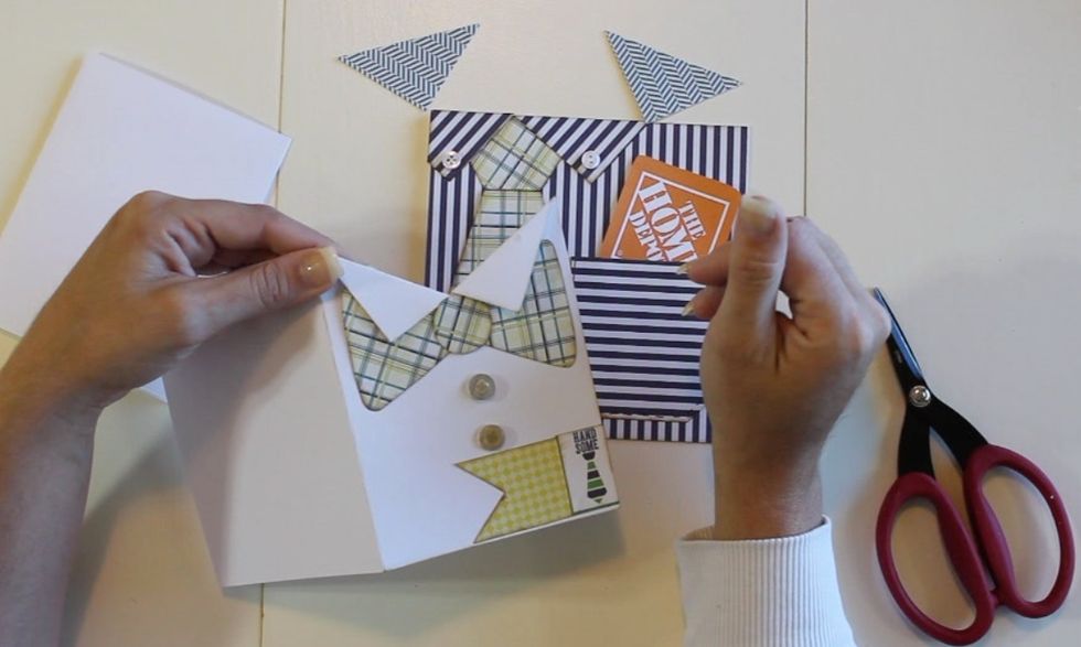 Then cut a slit in the middle of the card at the top about 2" down. Fold over the flaps to create the collar.