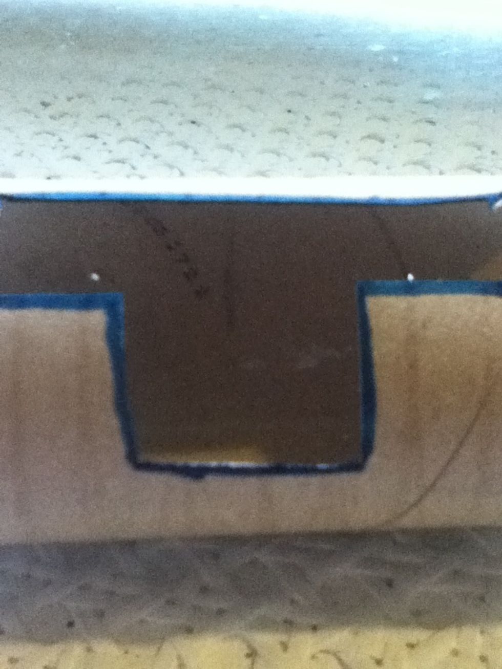 Then cut a small chunk out so it looks like a T. This will make it easier to press the buttons on your apple device.