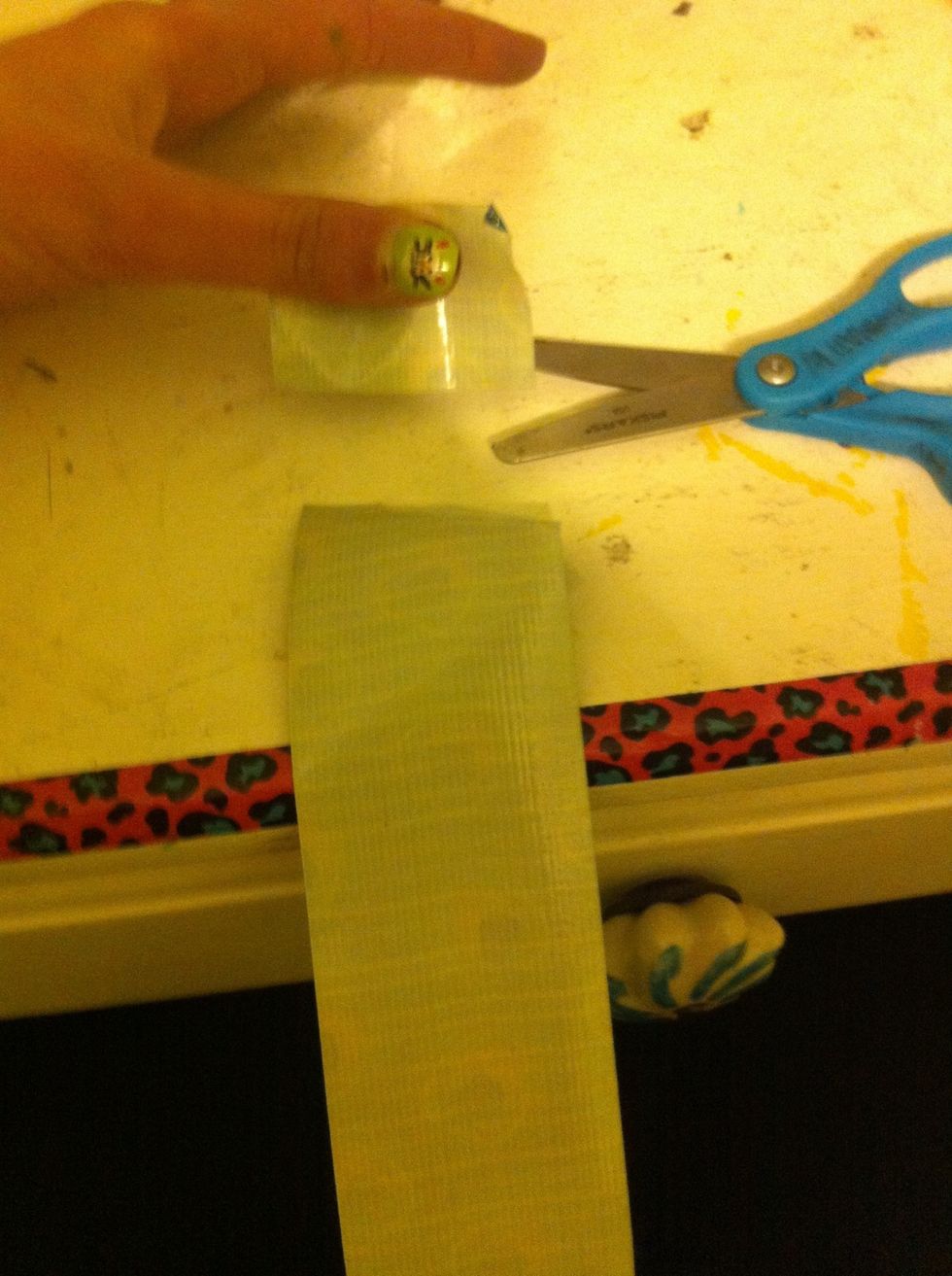 Then cut a small rectangle shape out of the tape.(make it more rectangle than square so you don't waste tape)