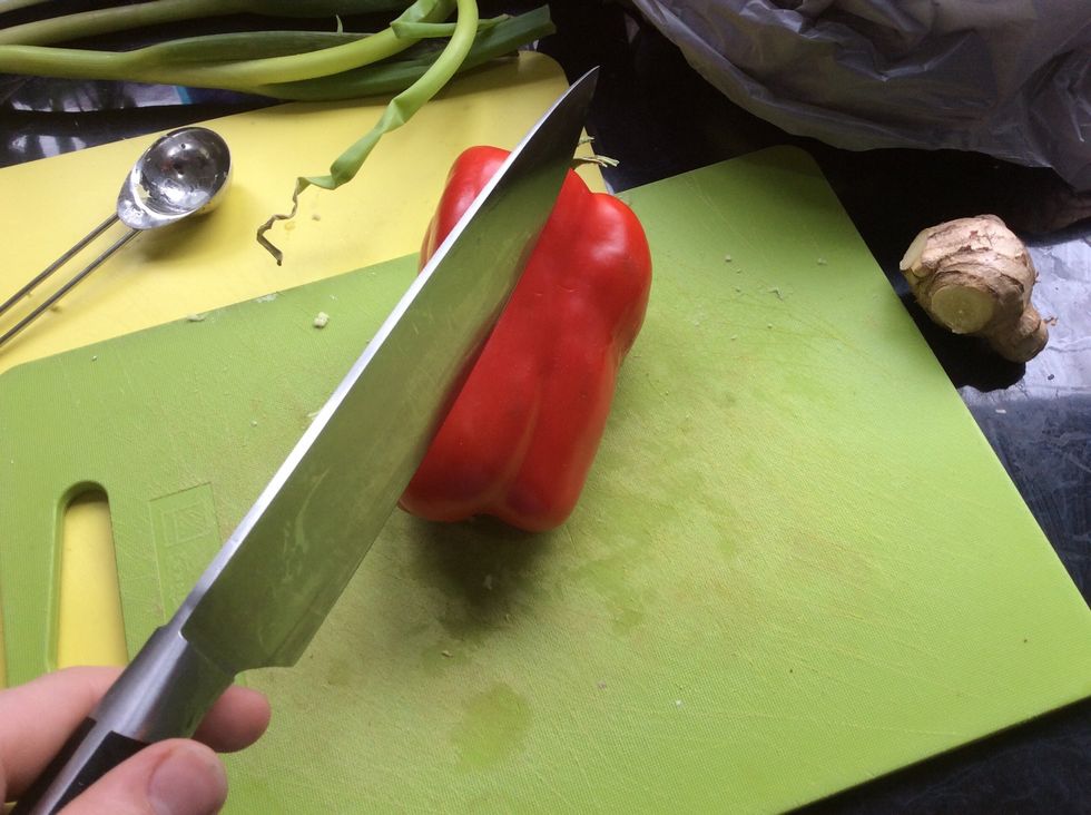 Then cut half of a capsicum into small squares