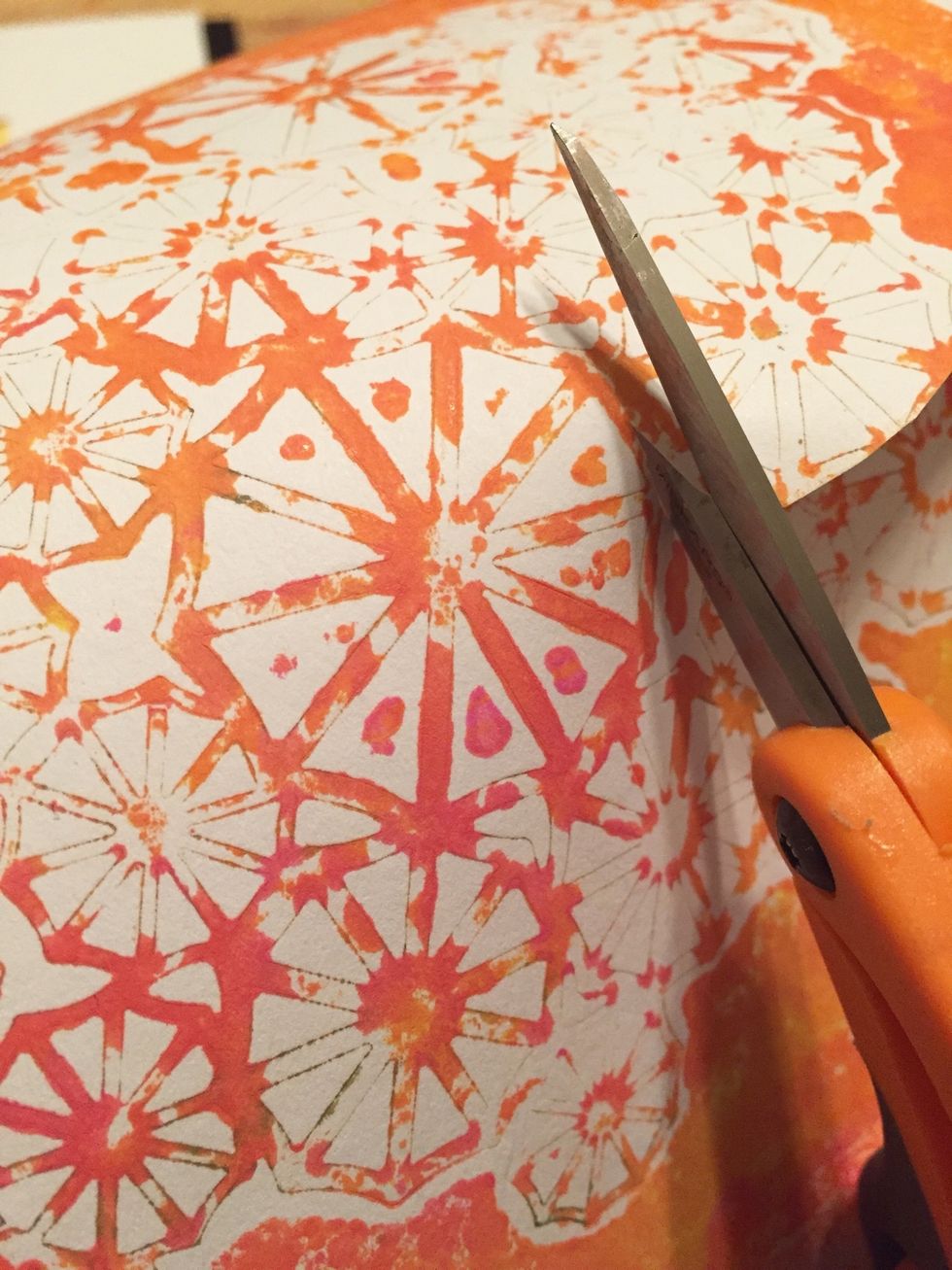 then cut out some parasols from monoprint made using parasol stencil and add them to collage.