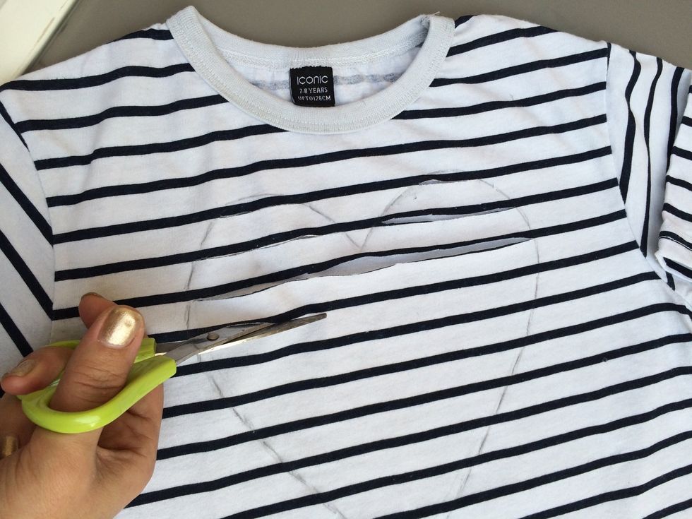 Then cut out stripe lines inside the shape that you drew before. You can cut the stripes horizontally or vertically inside your favorite shape.