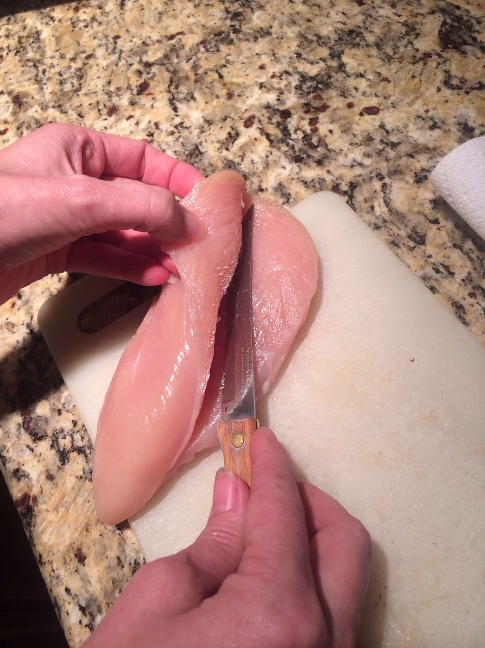 Then cut the chicken in half but not all the way