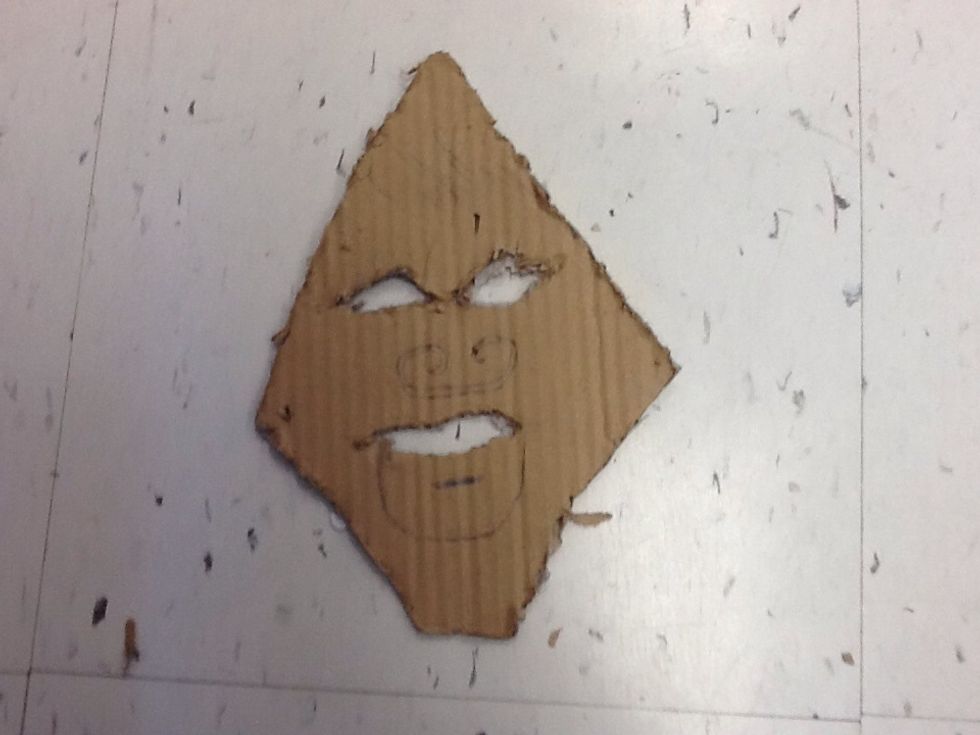 Then, cut the eyes and mouth out.