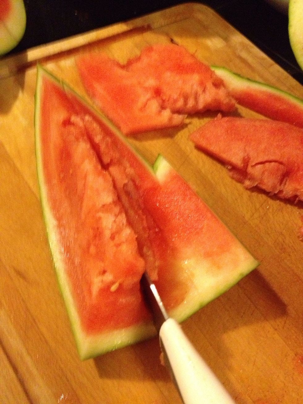 Then cut the watermelon into small cube to put inside the basket.