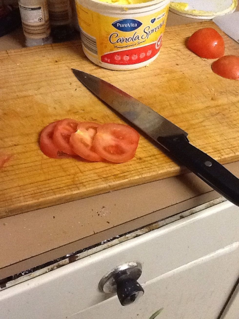 Then cut up your tomato, and add them to your sandwich.
