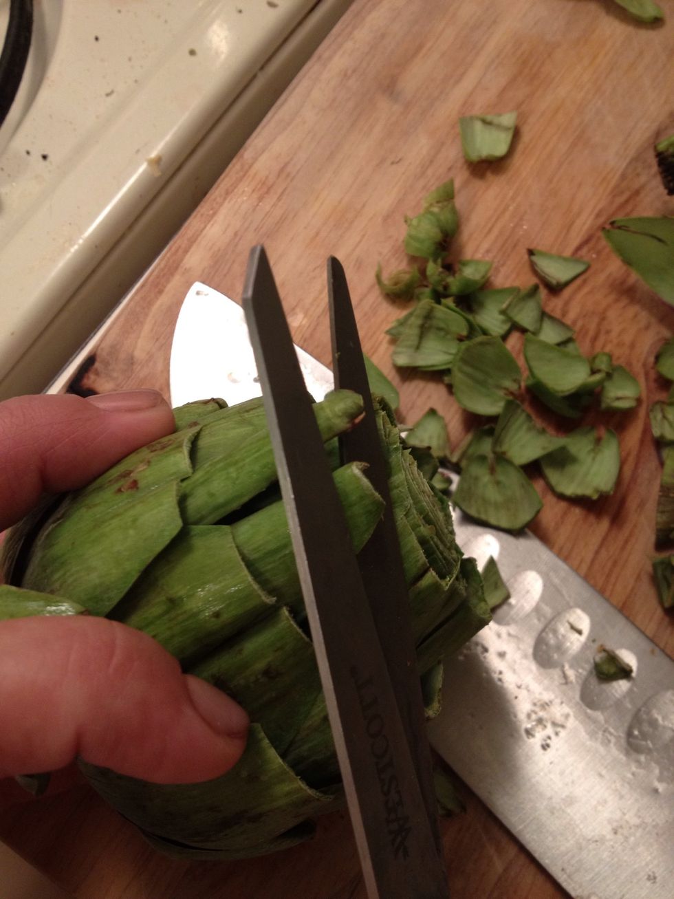 Then cutting the edges of the leaves with scissors