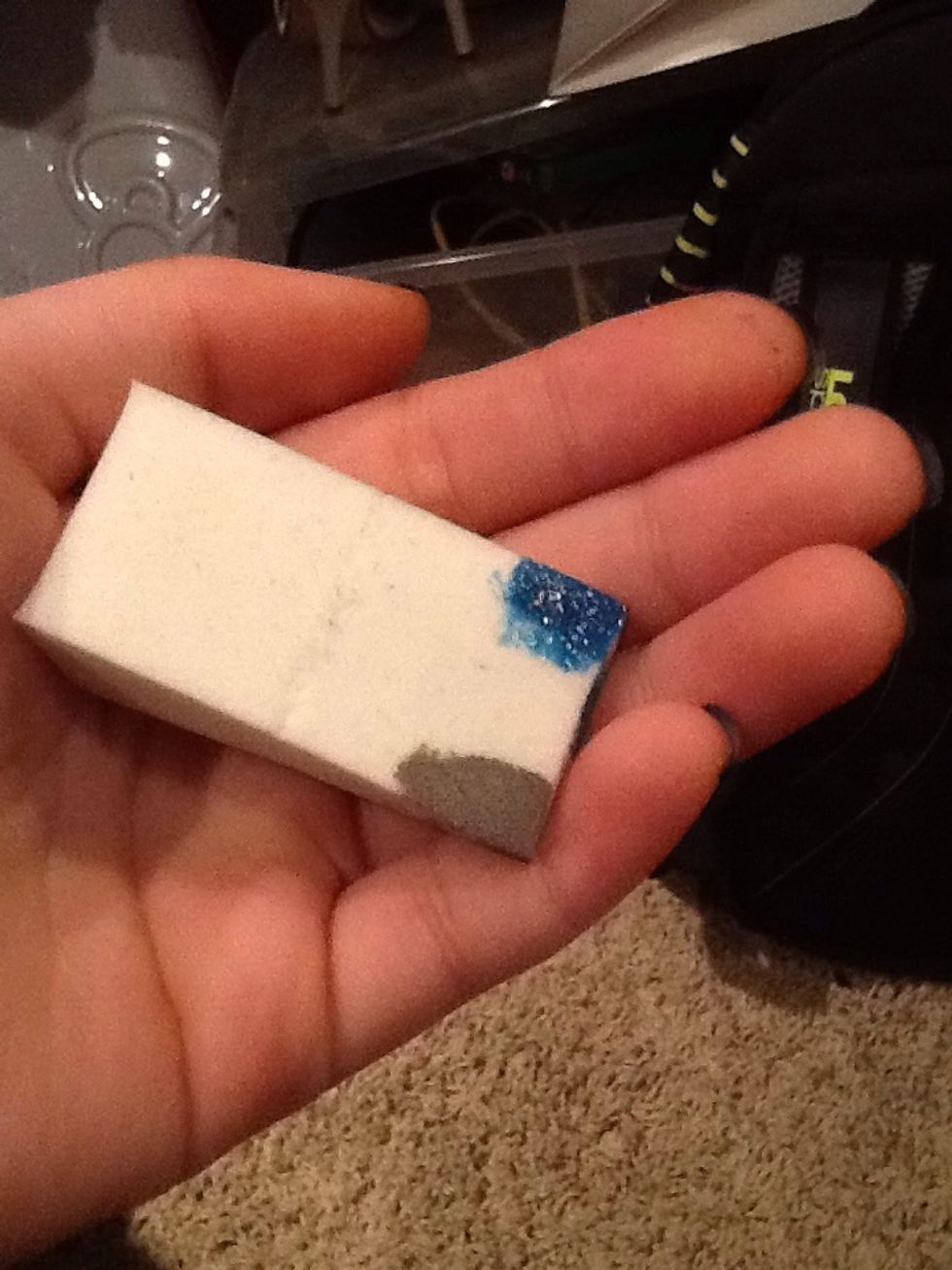 Then dab blue nail polish onto the sponge.