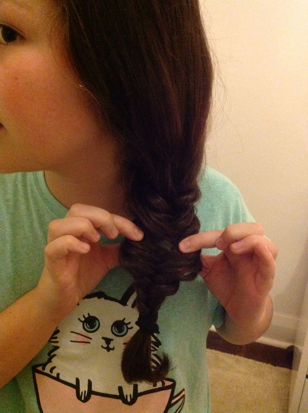 Then depending on how you want your fishtail, you can separate your fishtail to give it a more fuller look.