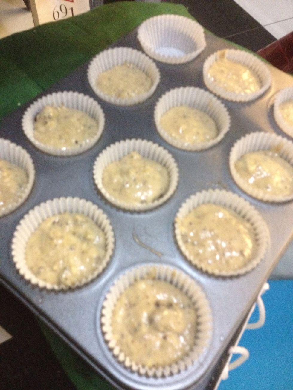 Then divide it into your muffin liners. Somehow.... You get 11 cupcakes for this recipe and not 12.... Idk how that happens... Anyways, don't bake yet! We're not done. ;)