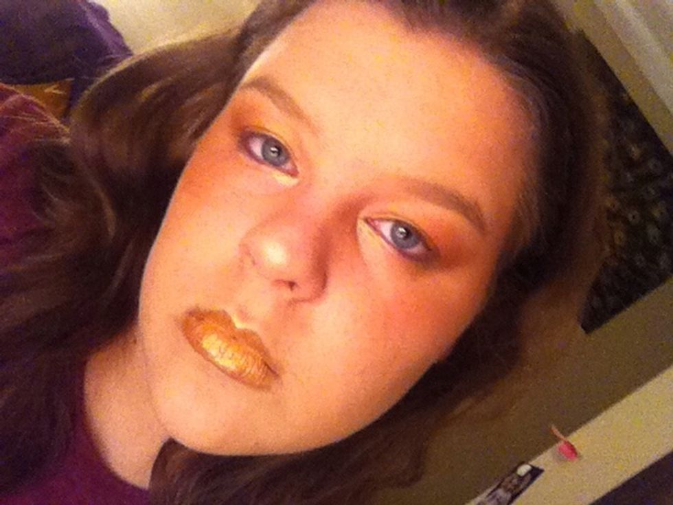 Then do a gold eye and highlight and you are done
